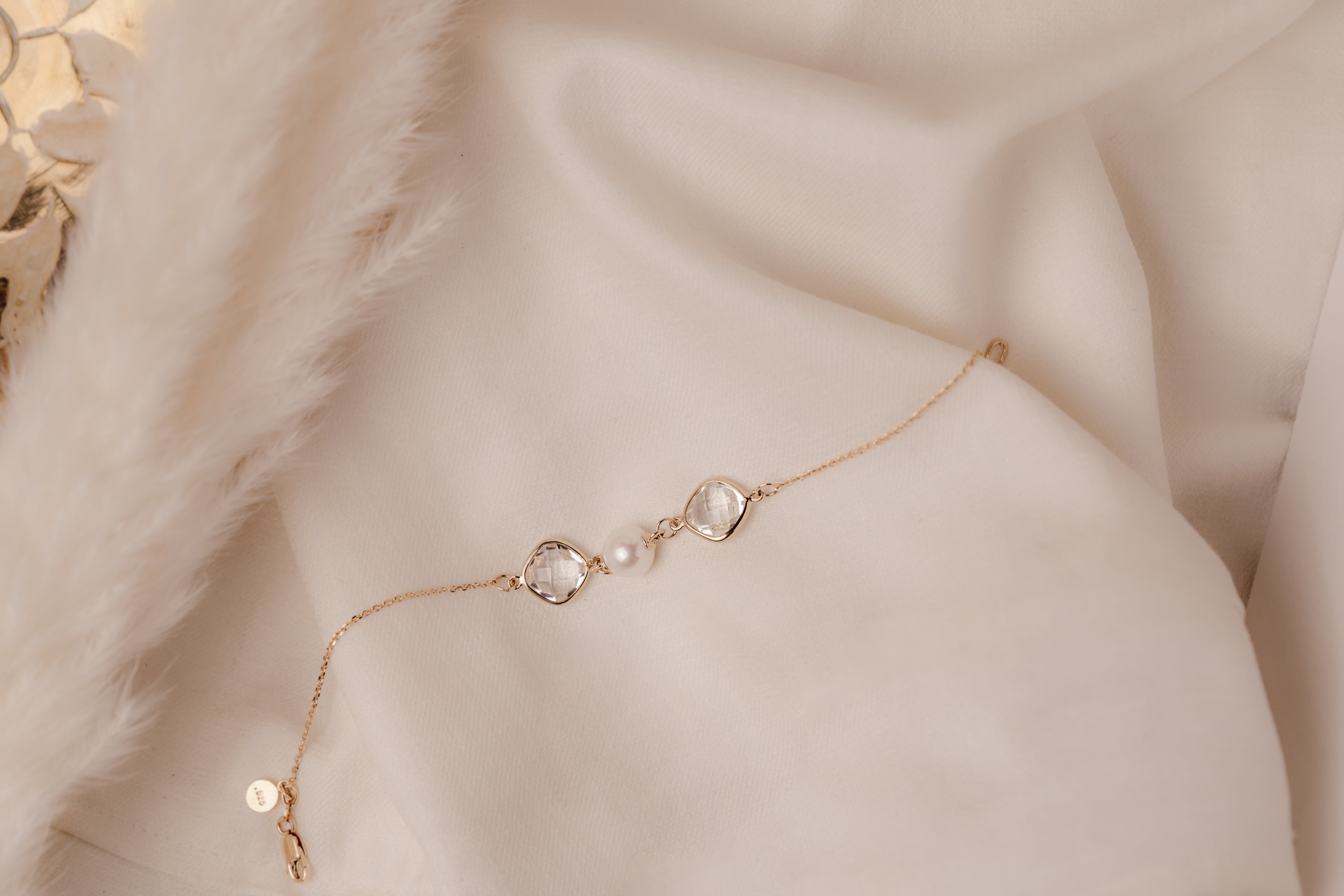 Cushion and Pearl-Essence Bracelet